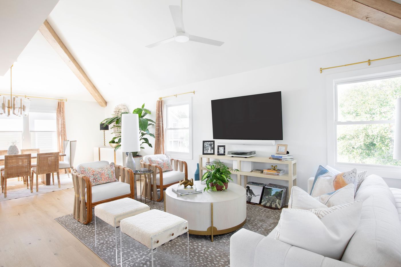Living room with white sofa and rattan chairs