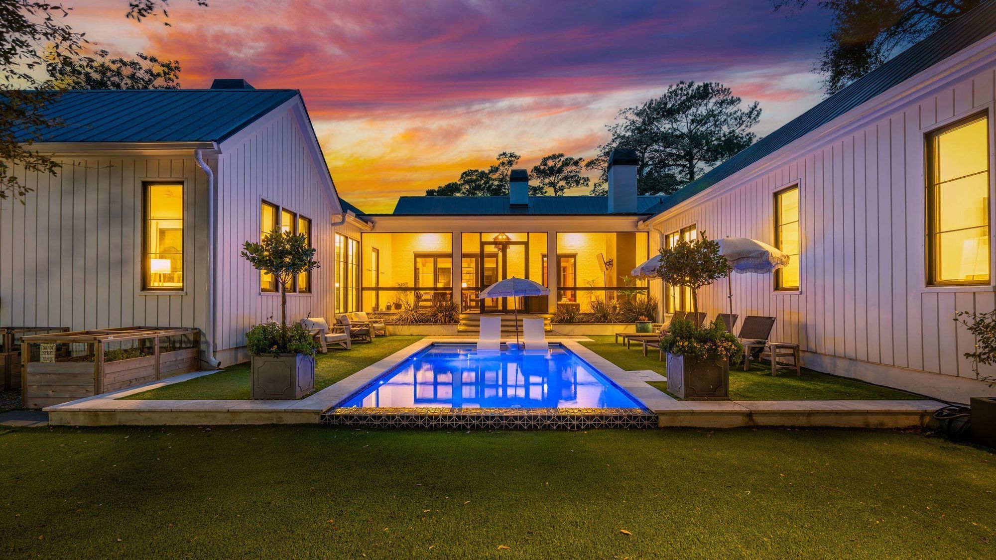 Courtyard pool at dusk, house designed by Krystine Edwards